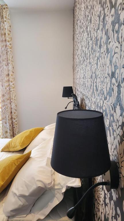 Postel nebo postele na pokoji v ubytování Domus Mia