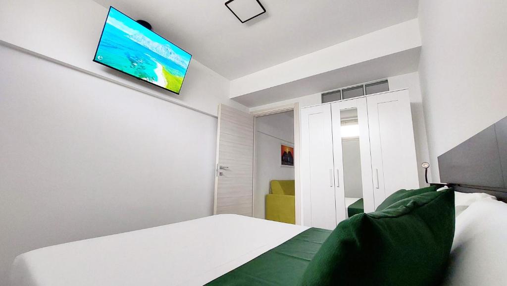 TV a/nebo společenská místnost v ubytování Orlando - Locazione Turistica
