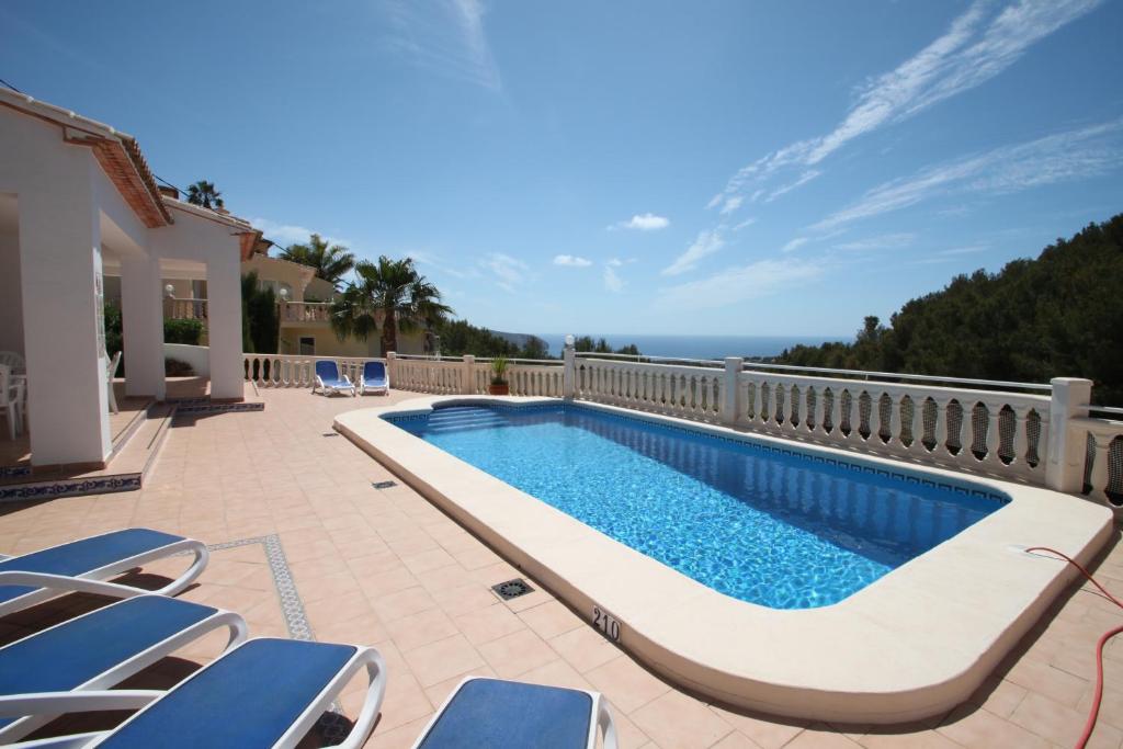 The swimming pool at or close to Sesam - sea view villa with private pool in Moraira