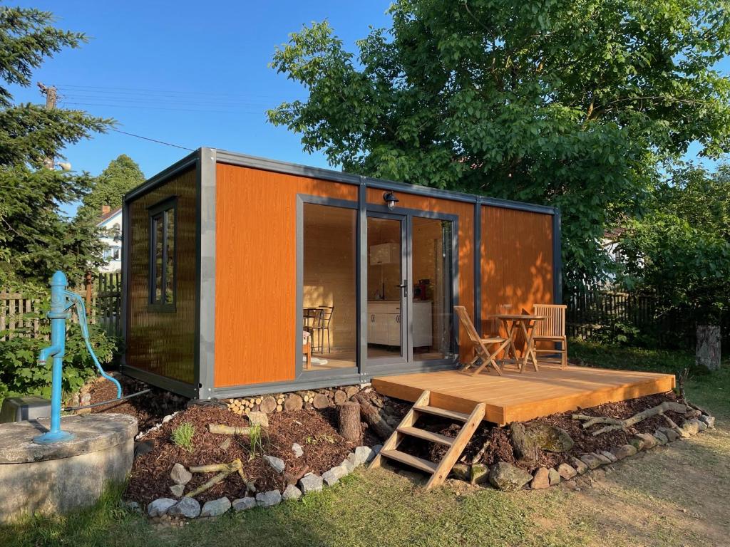 a tiny house sitting on top of a pile of rocks at Tiny House HaleLuJa 