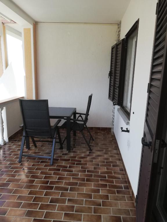 TV a/nebo společenská místnost v ubytování Casa Maslina - 2