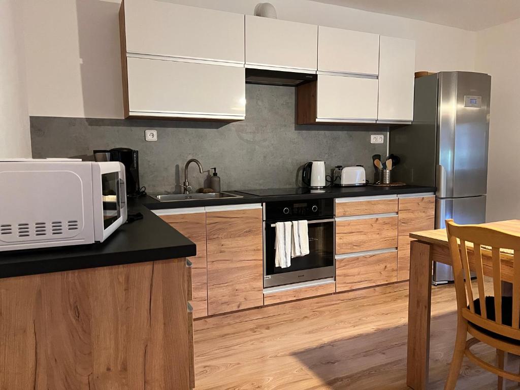 Kuchyň nebo kuchyňský kout v ubytování Apartmán Elen - 6 lůžek, 86 m2