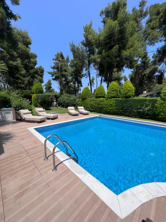 The swimming pool at or close to Sani Green Villa