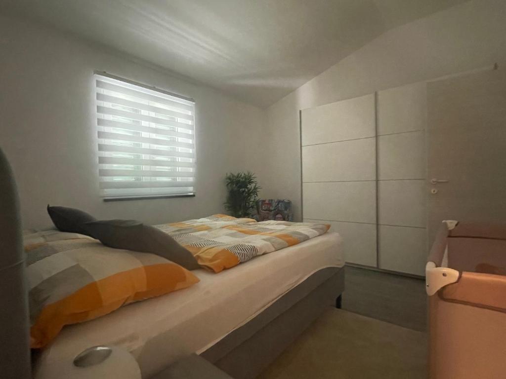 Postel nebo postele na pokoji v ubytování Villa Dupini