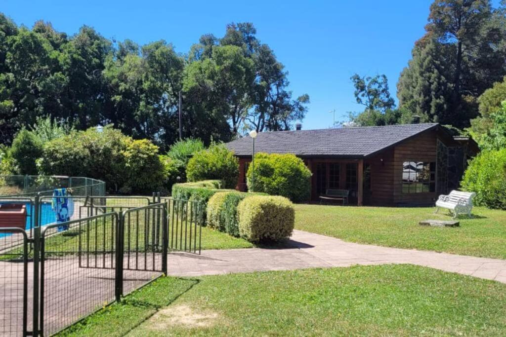 Zahrada ubytování Céntrico departamento a pasos del lago