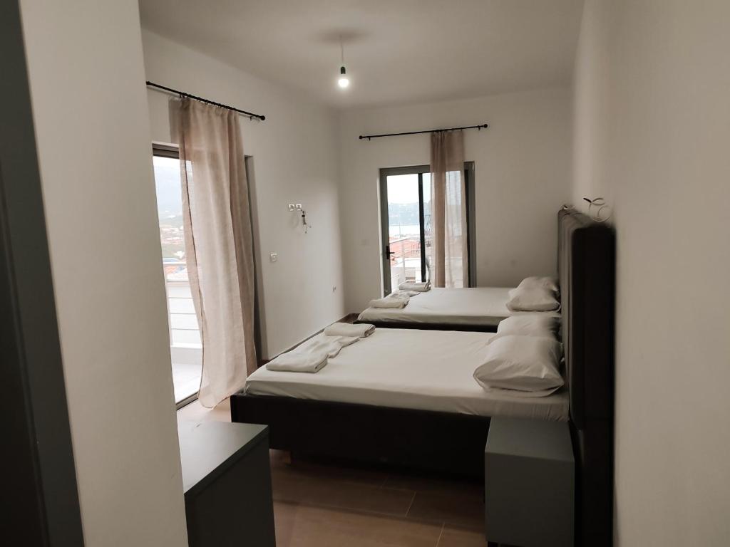 Postel nebo postele na pokoji v ubytování Petros rooms