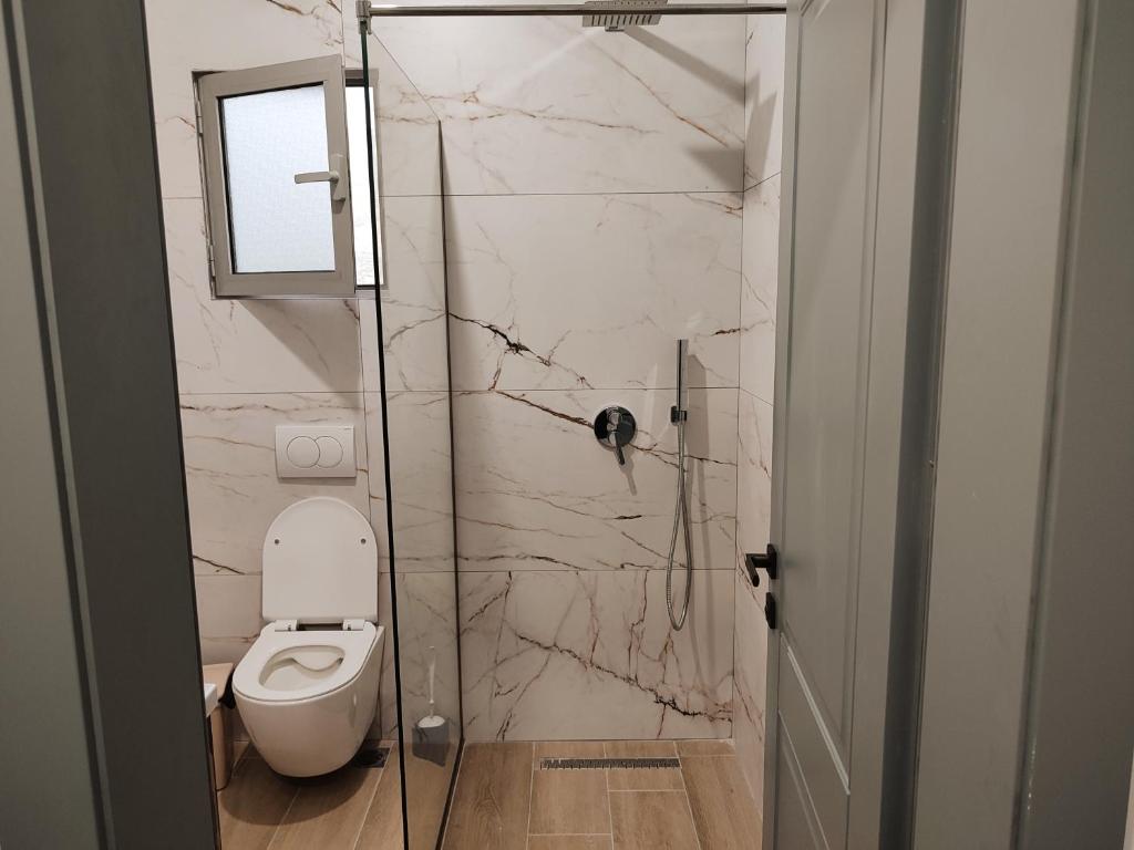 Koupelna v ubytování Petros rooms