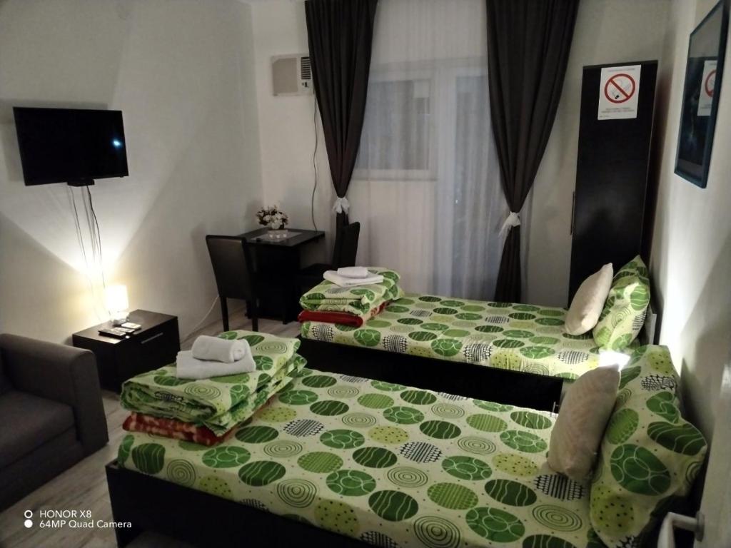 Postel nebo postele na pokoji v ubytování Mitić Apartmani 1