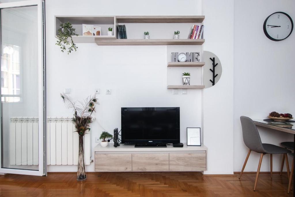 Sjónvarps- og/eða afþreyingartæki á Apartman Vas dom 2