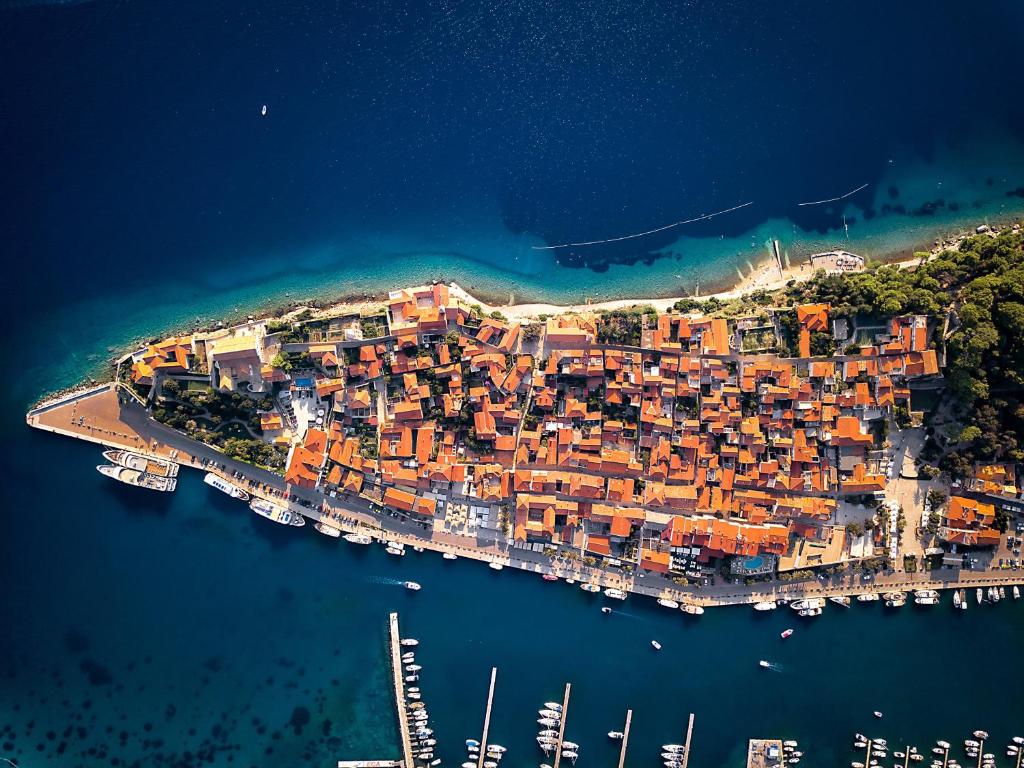 an aerial view of a small island in the water at Arbe Downtown in Rab