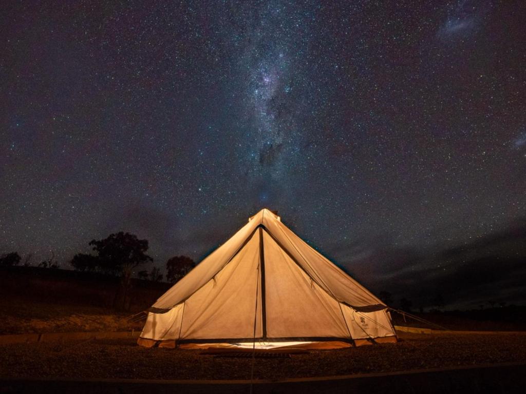 a white tent under a starry night sky at Glenayr Farm in Windeyer