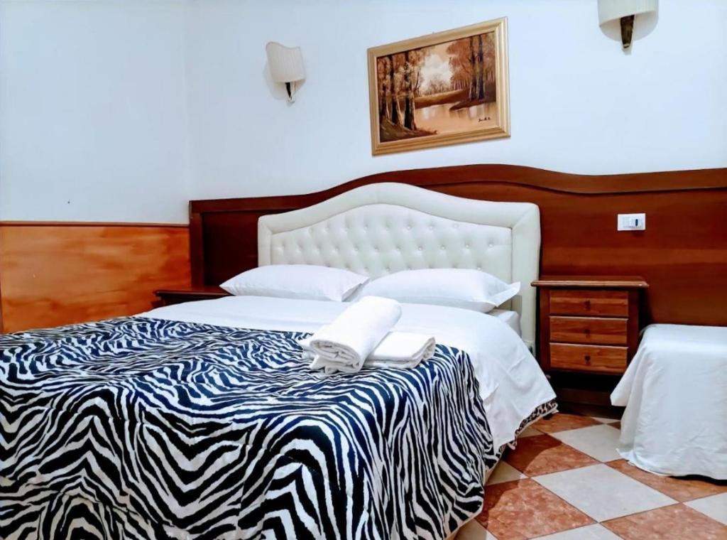 A bed or beds in a room at cattaneo accomodation