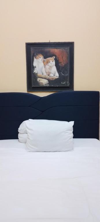 Säng eller sängar i ett rum på Bougenville Homestay