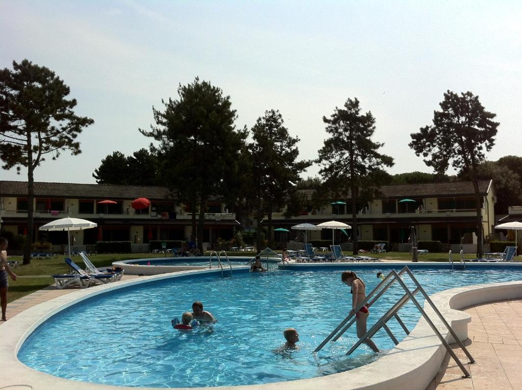 The swimming pool at or close to Bibione Residence Apartments