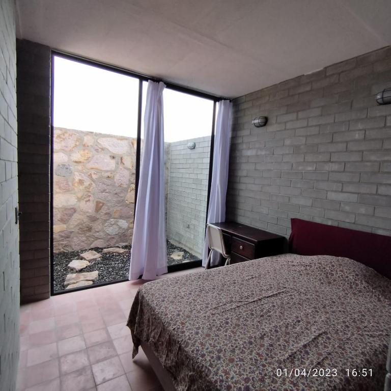 Ένα ή περισσότερα κρεβάτια σε δωμάτιο στο Hab Sencilla en casa Pera