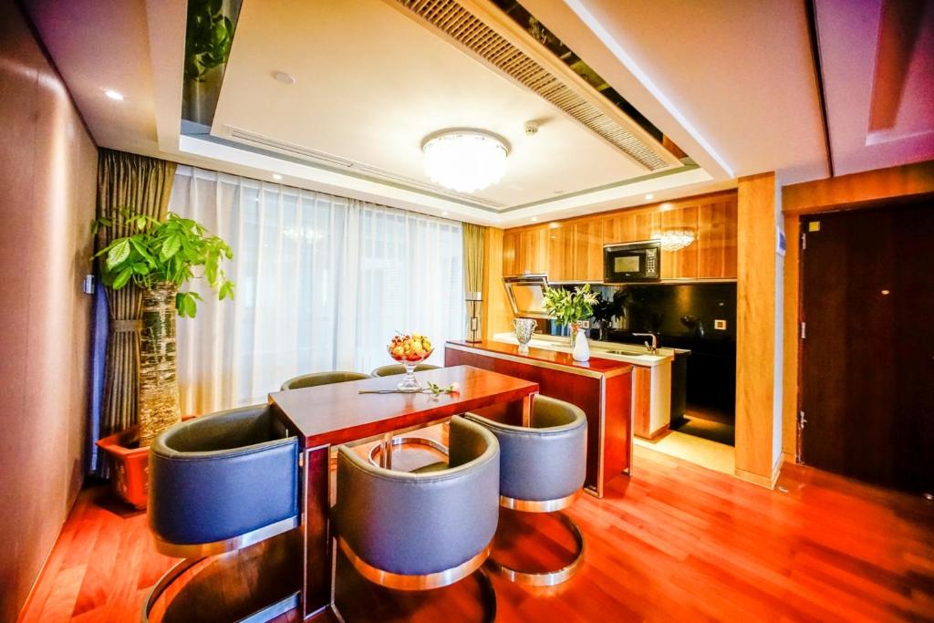 Kuchyň nebo kuchyňský kout v ubytování Sentosa Hotel Apartment Taoyuan Branch