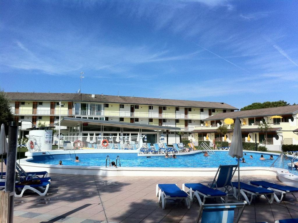 The swimming pool at or close to Bibione Residence Apartments
