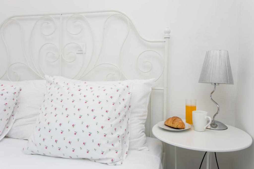 Postel nebo postele na pokoji v ubytování Apartments Heart of Dubrovnik