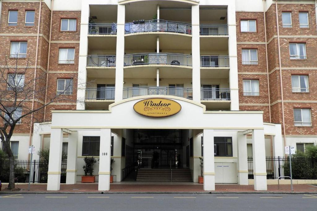 Hotel 11 on Hurtle, a building with a sign on the front of it at 11 on Hurtle in Adelaide