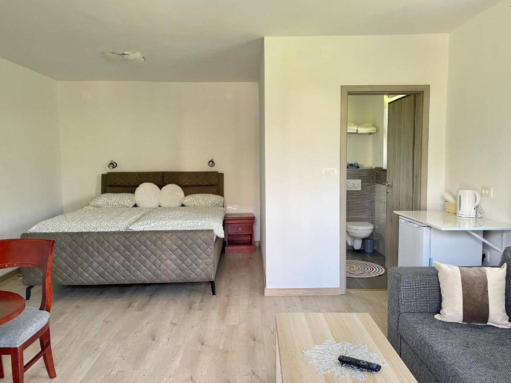 Postel nebo postele na pokoji v ubytování Ana Rooms Bled