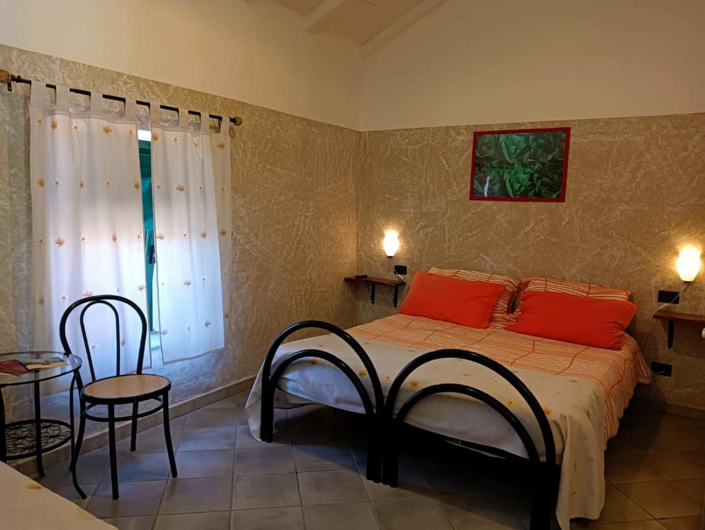 Postel nebo postele na pokoji v ubytování Terra Del Bosco Agriturismo