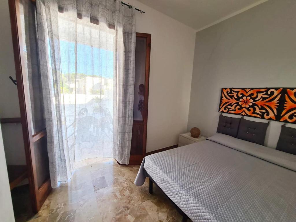 Postel nebo postele na pokoji v ubytování casa al mare kalispera