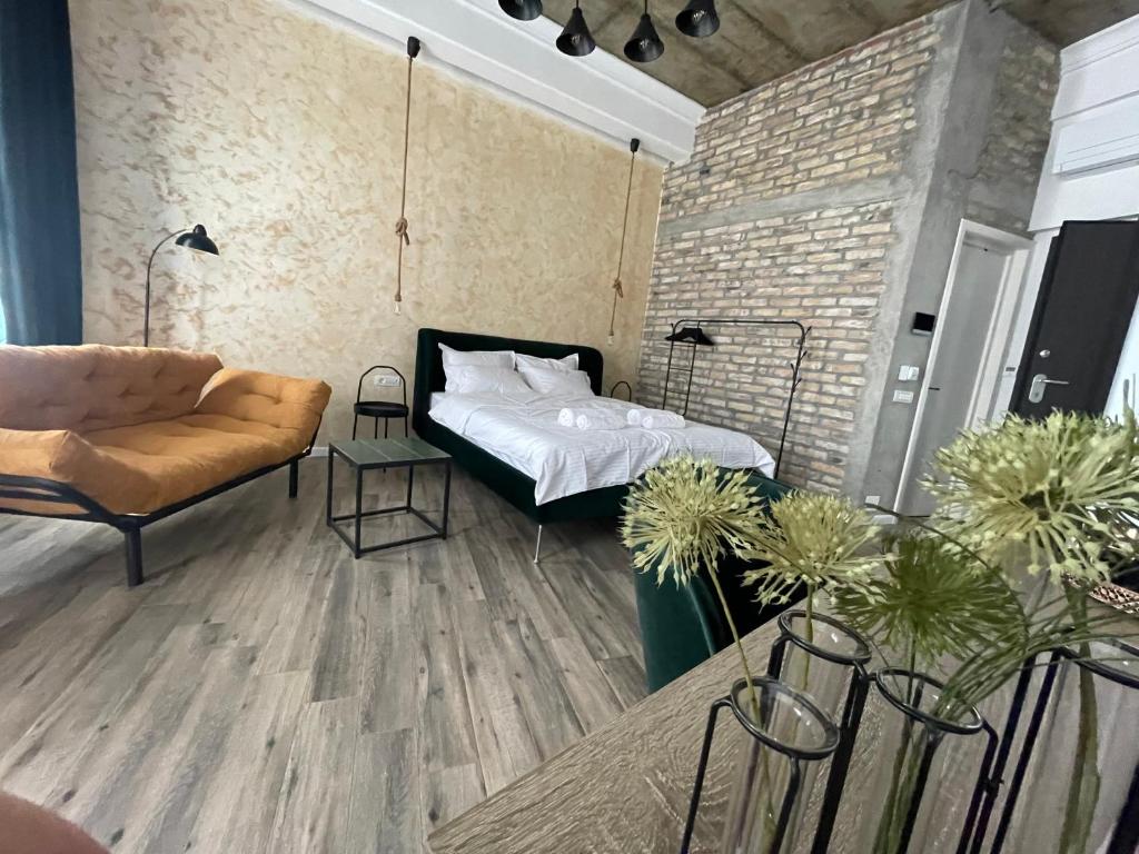 Postel nebo postele na pokoji v ubytování Tomis’ Dreams