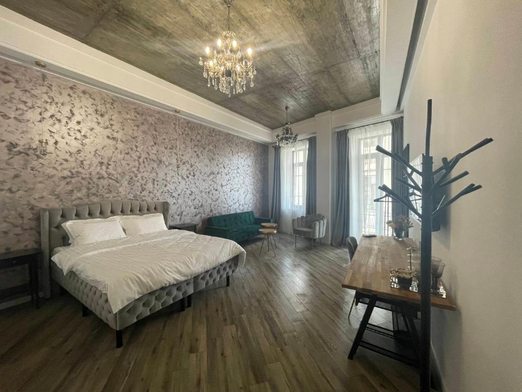 Postel nebo postele na pokoji v ubytování Tomis’ Dreams