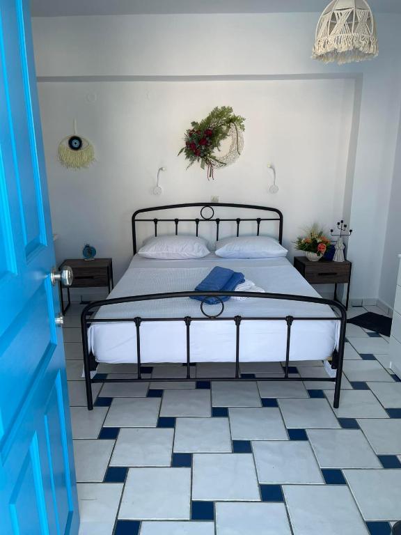 Postel nebo postele na pokoji v ubytování GIAVASI SEASIDE FINIKI