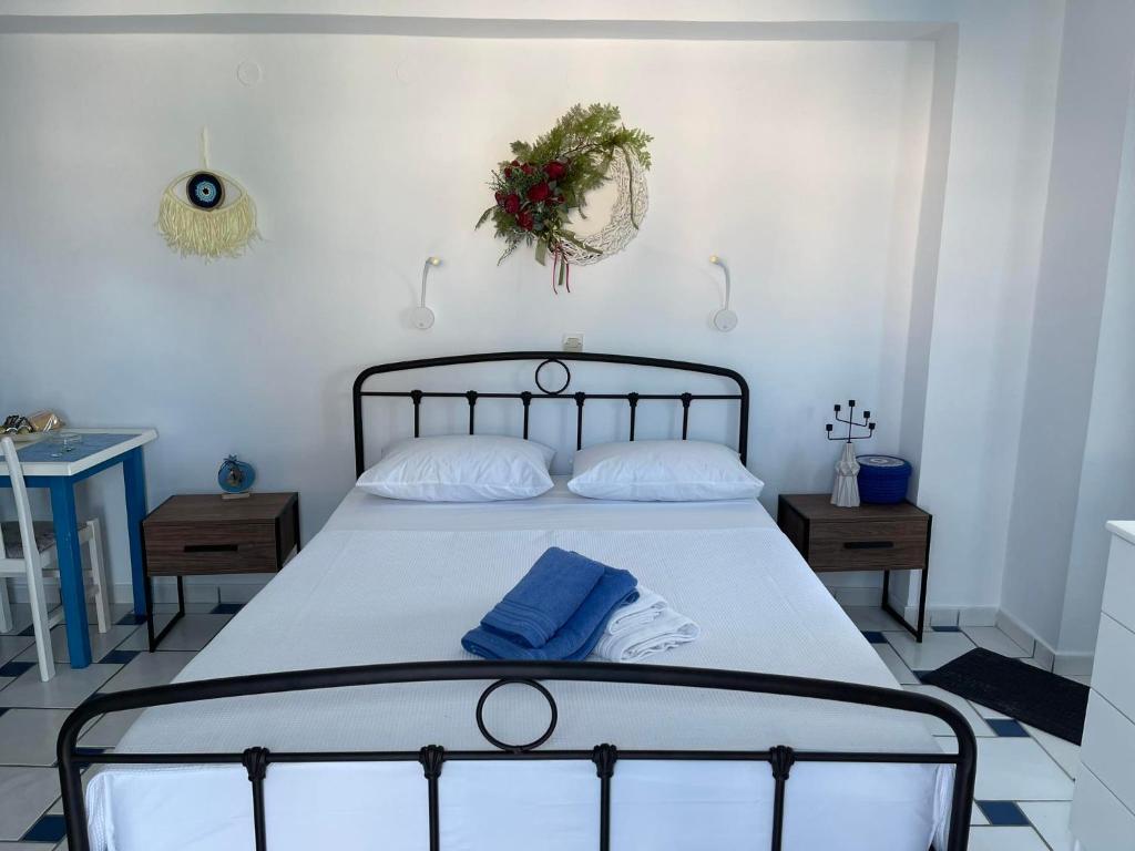 Postel nebo postele na pokoji v ubytování GIAVASI SEASIDE FINIKI