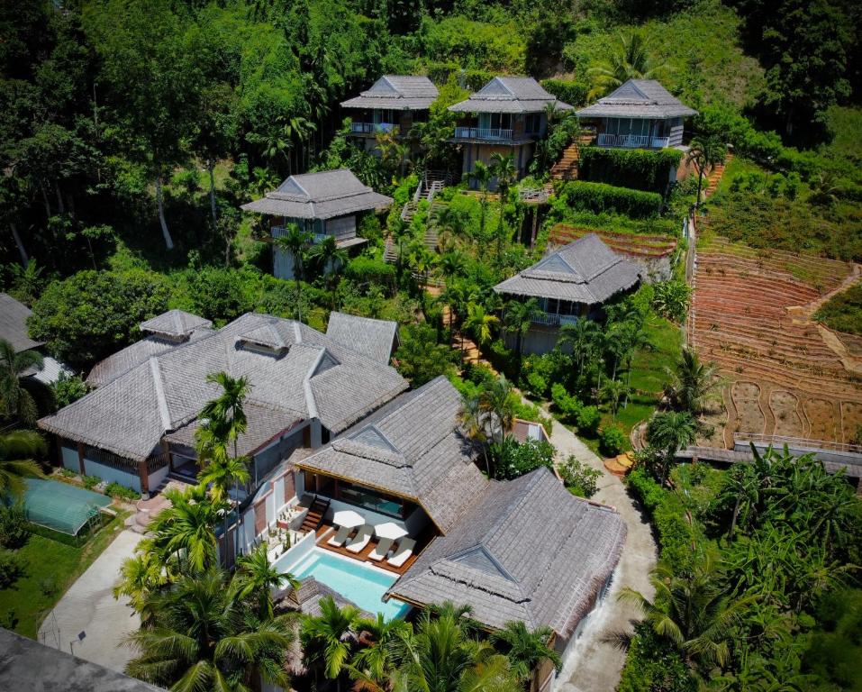 an aerial view of a house with a swimming pool at Baan Phuvara Retreat - Romantic Jacuzzi Mountain View Villas in Ao Nang Beach