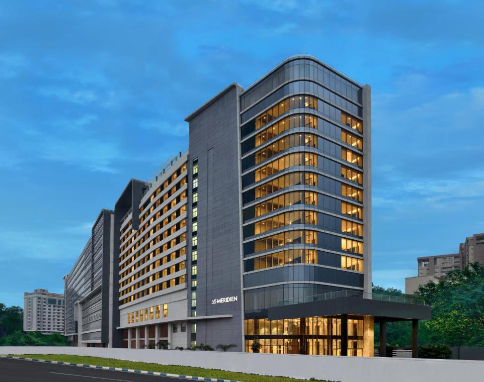 a rendering of a building with lights on at Le Meridien Hyderabad in Hyderabad