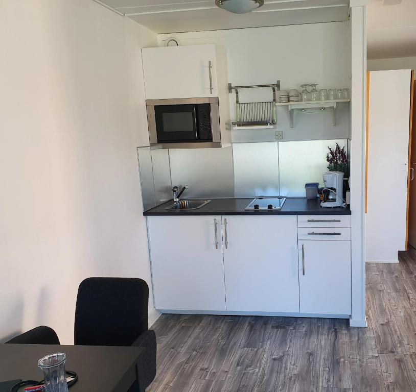 Kuchyň nebo kuchyňský kout v ubytování Hotell Dalsland