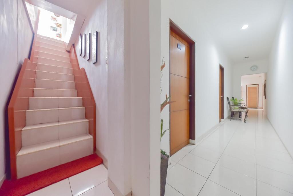 Fotografie z fotogalerie ubytování RedDoorz Syariah near Taman Bekapai 2 v destinaci Klandasan Kecil