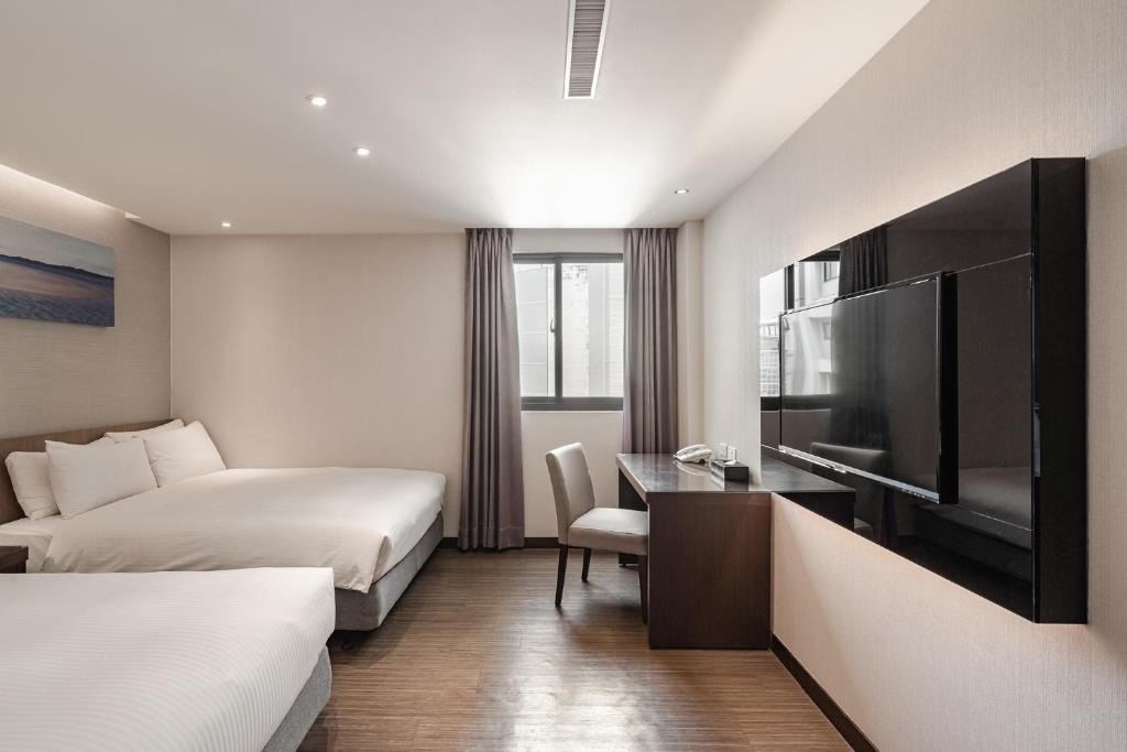 TV a/nebo společenská místnost v ubytování Hotel Yoshi
