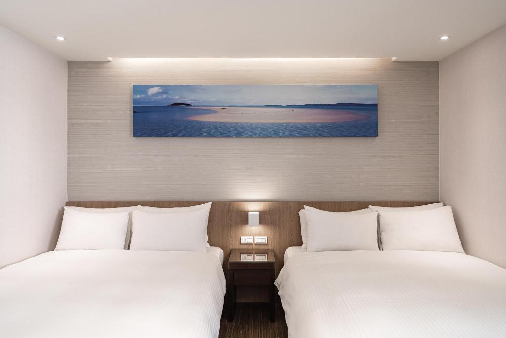 Postel nebo postele na pokoji v ubytování Hotel Yoshi