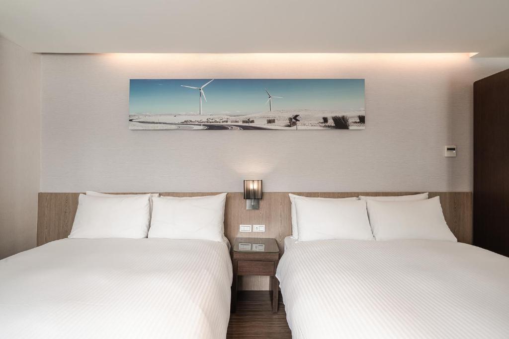 Postel nebo postele na pokoji v ubytování Hotel Yoshi