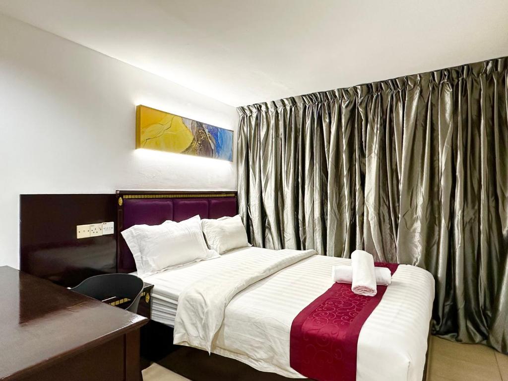 Postel nebo postele na pokoji v ubytování VALLEY HOTEL