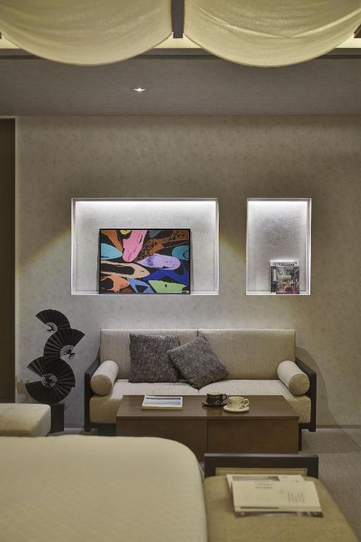 TV a/nebo společenská místnost v ubytování Merry Day Motel Zhonghe Branch
