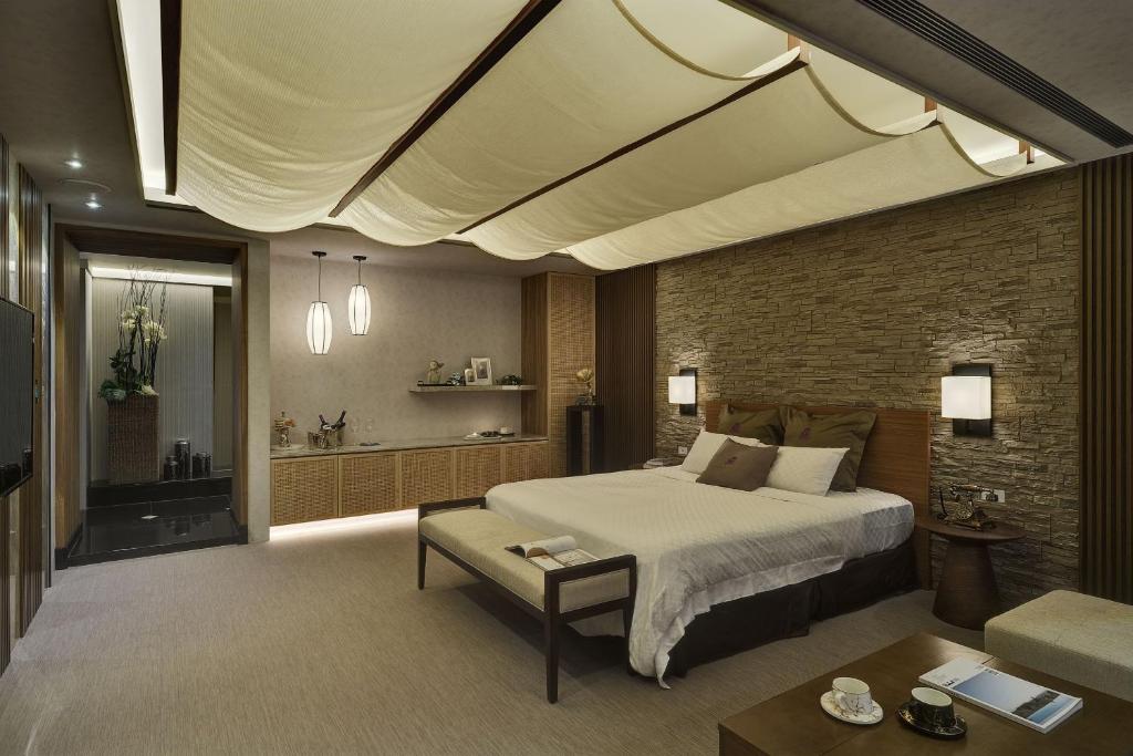 Postel nebo postele na pokoji v ubytování Merry Day Motel Zhonghe Branch