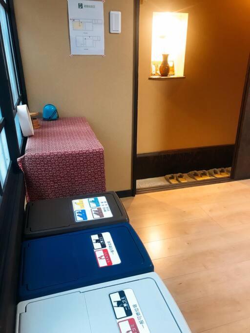 Postel nebo postele na pokoji v ubytování Kisya---Kyoto Machiya Guesthouse