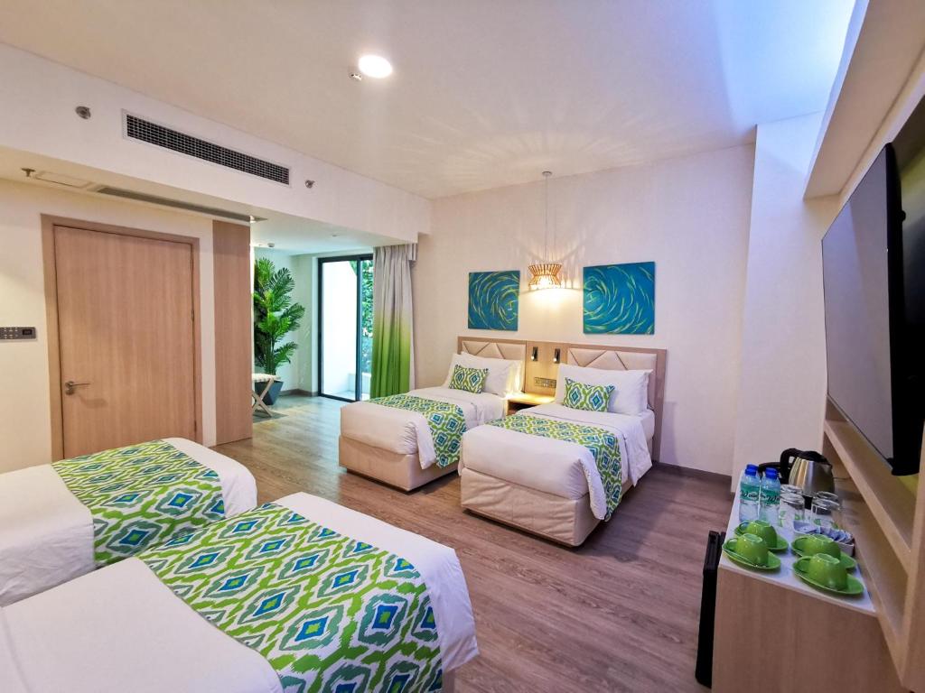 Postel nebo postele na pokoji v ubytování Lime Resort El Nido