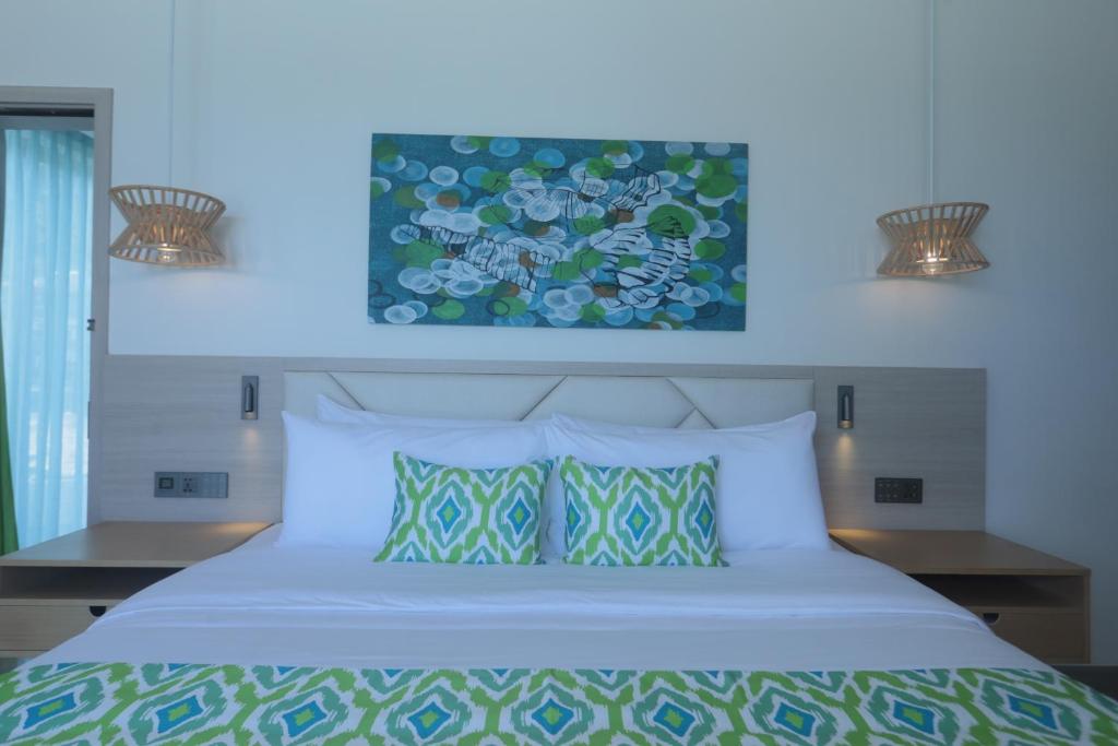 Postel nebo postele na pokoji v ubytování Lime Resort El Nido