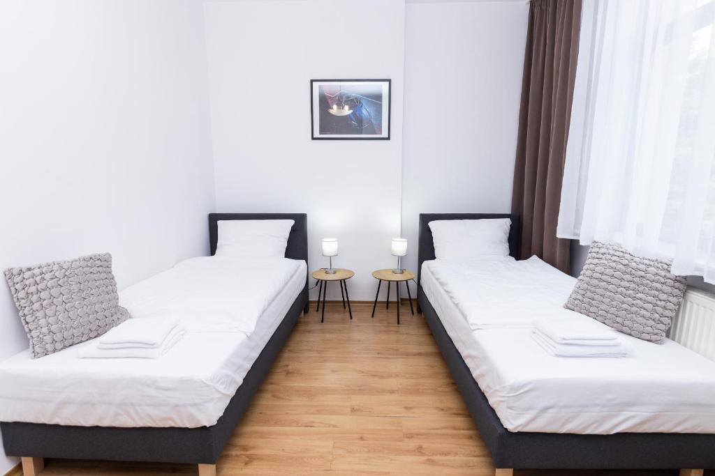 Postel nebo postele na pokoji v ubytování Hotel Tor Kielce