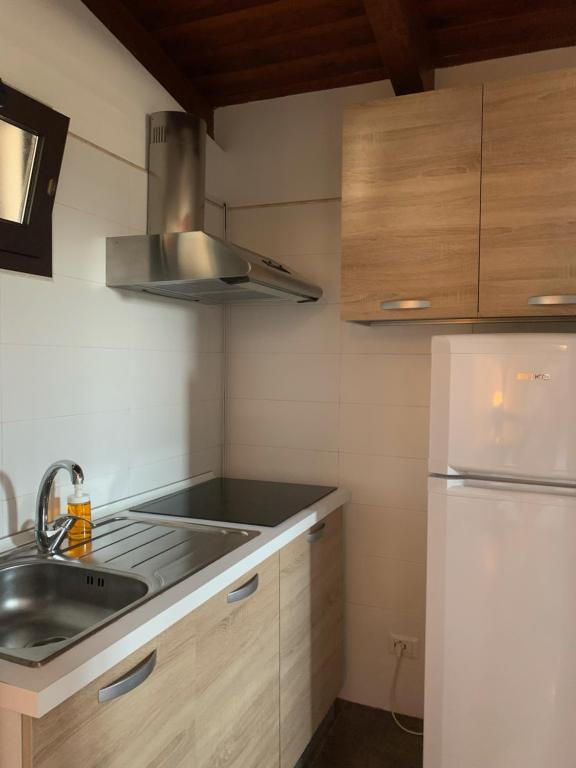 Kuchyňa alebo kuchynka v ubytovaní Spiaggia Le Dune Residence