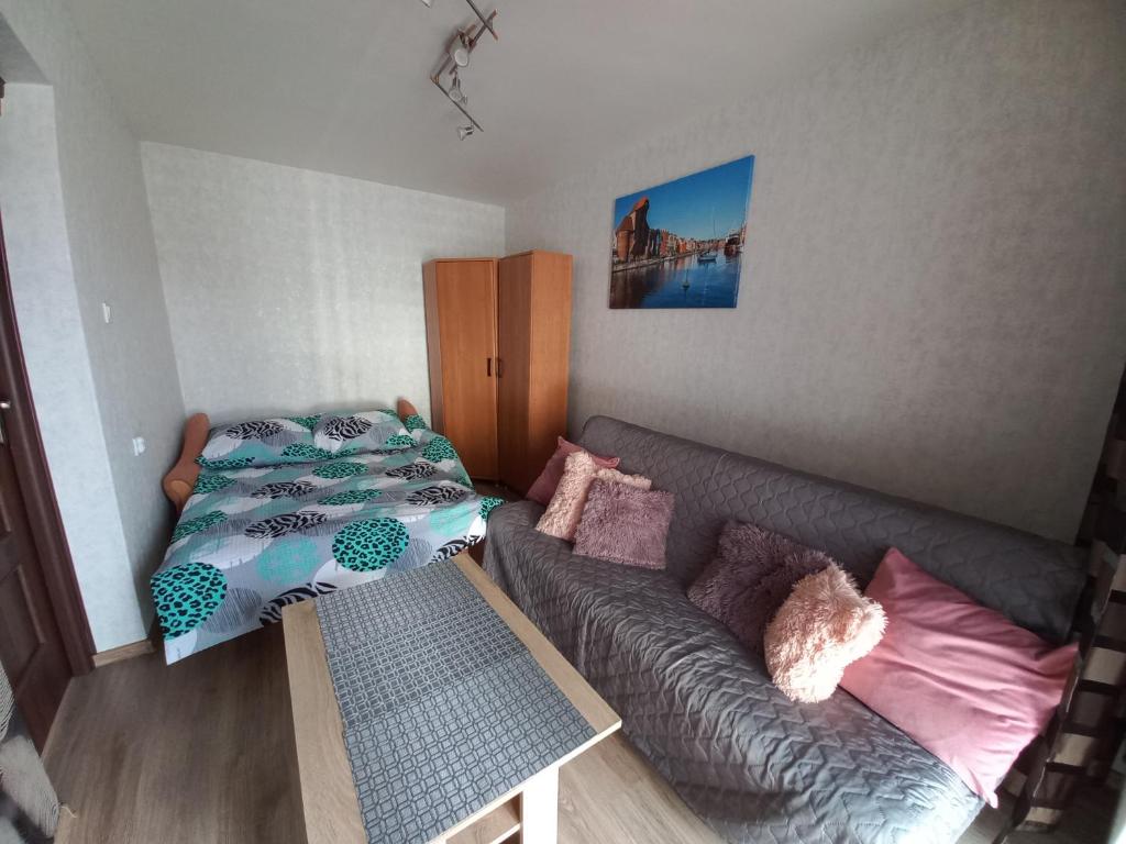 Posteľ alebo postele v izbe v ubytovaní Apartament na Podwalu