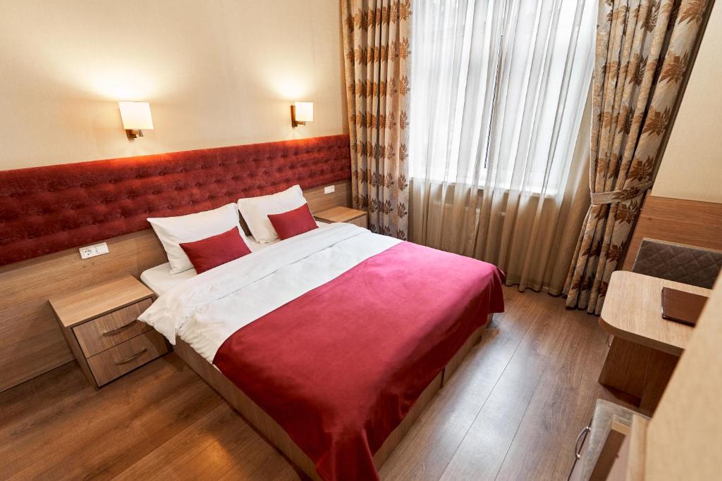 Postel nebo postele na pokoji v ubytování Hotel Classic