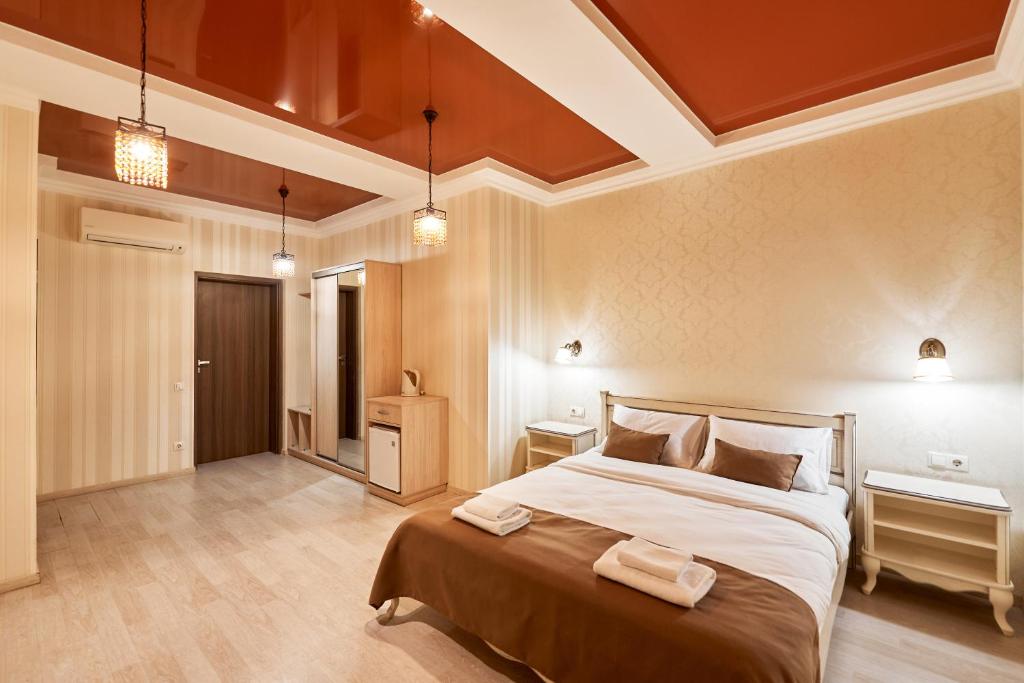 Postel nebo postele na pokoji v ubytování Hotel Classic
