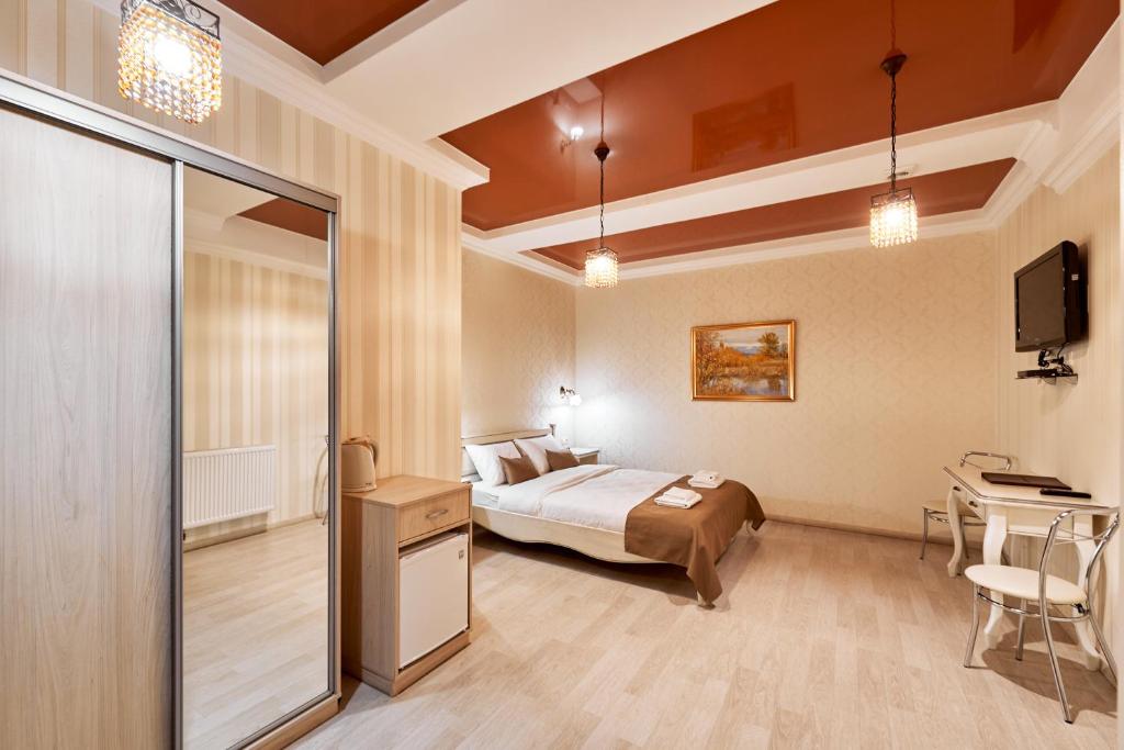 Postel nebo postele na pokoji v ubytování Hotel Classic