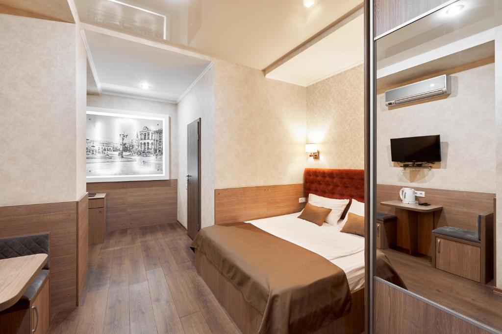 Postel nebo postele na pokoji v ubytování Hotel Classic